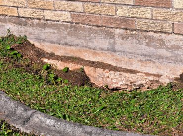 Water Drainage Problem on the Side of a House - K-Guard Heartland