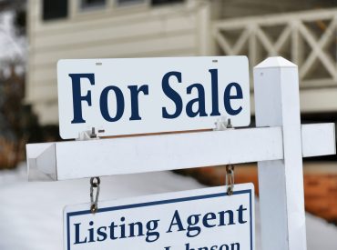 for-sale-sign-in-front-of-home-house-real-estate-2022-11-14-04-29-27-utc