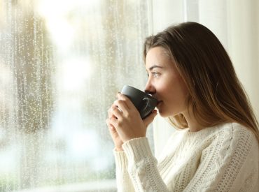 Side,View,Portrait,Of,A,Relaxed,Teen,Drinking,Coffee,Looking